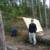 Dan, at our McEwen campsite.  We had a lot of "issues" with wind on this site, and setting up a tarp was kind of tough.  We never needed it for rain, but it was really useful when we were cooking.  Without the tarp, it was pretty hard.  