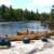 Canoes on the south side of the portage at Bald Rock Falls.  