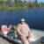 Shelly in the Boat we rented from Voyageur Canoe Outfitters.  We were not too sure she would actually go out and fish with us, but these nice lund boats made that a possibility.  